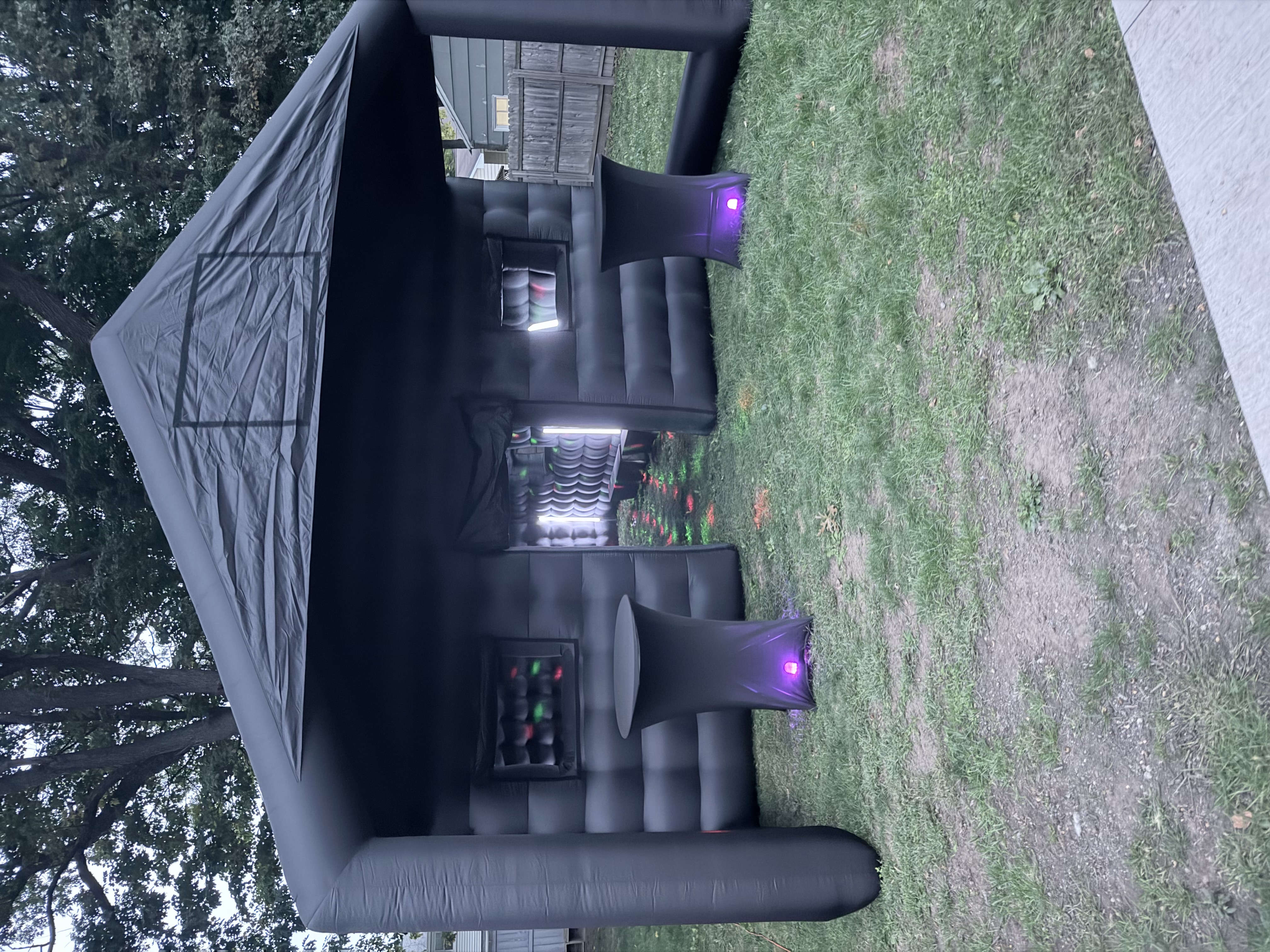 Black inflatable mobile bar set outdoors